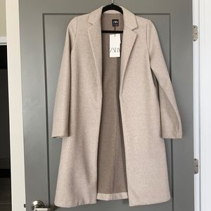 Zara jacket. 100% polyester. NEVER USED.